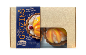 Lielais groziņš ar vārīto kŗemu un persikiem